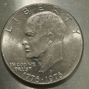 Eisenhower 1776-1976 Dollar with a filled in mint mark, Variety 1